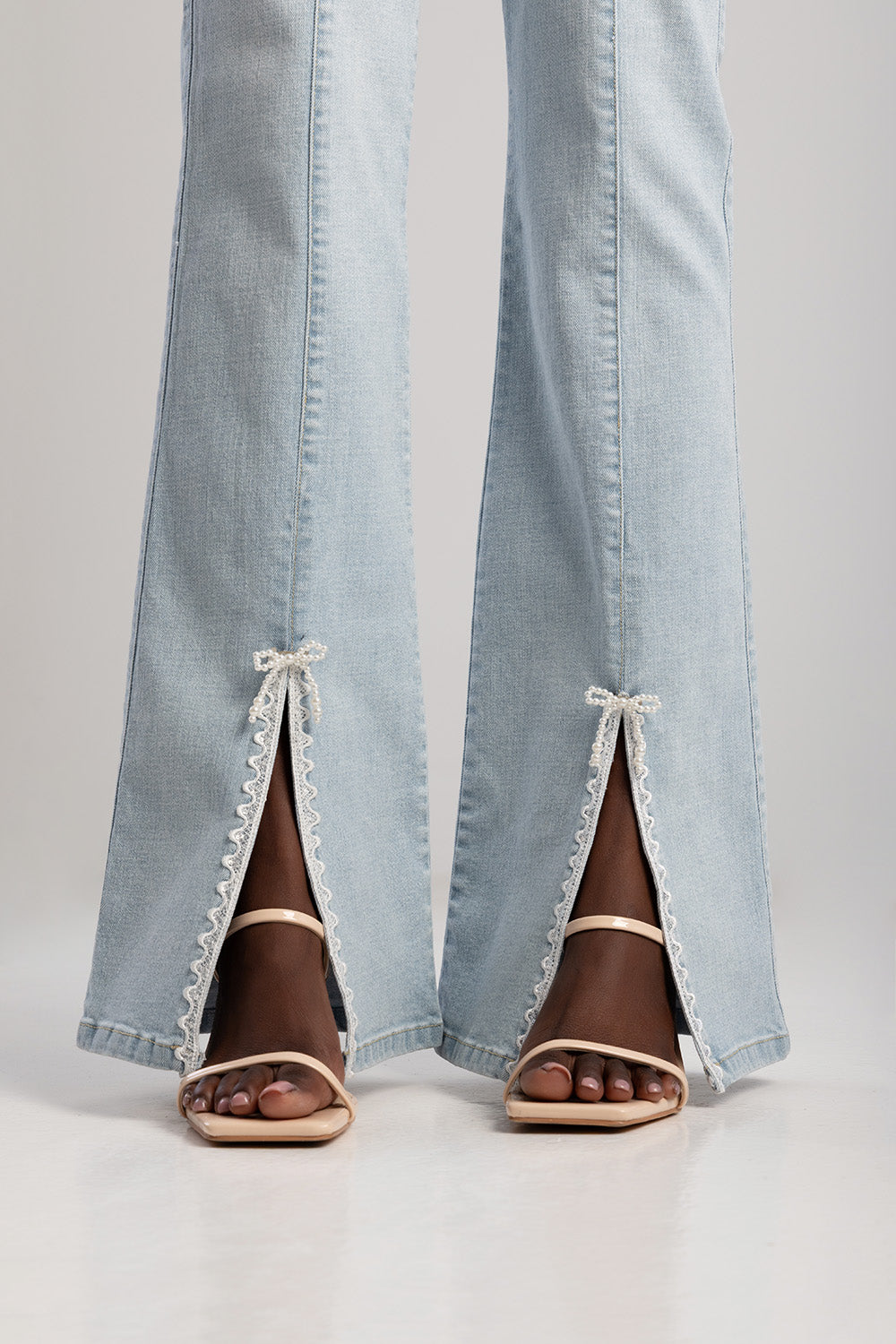 Mid Waist Bootleg Denim With Trim - Light Wash