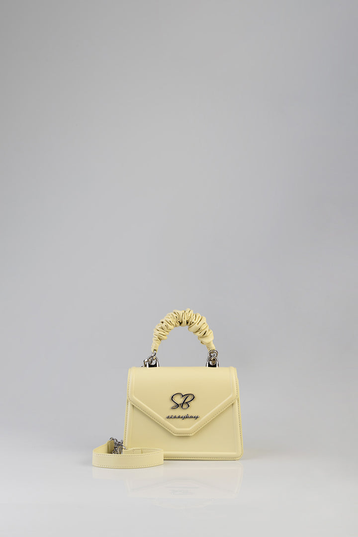Primrose Mini Bag With Pompom Strap - Butter Yellow