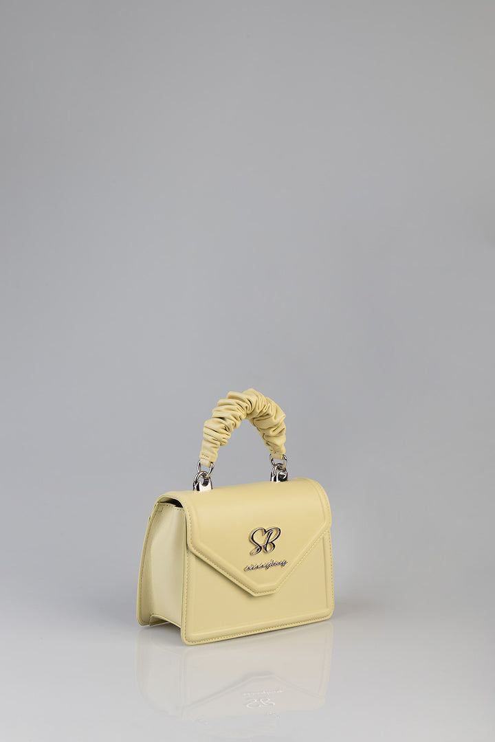 Primrose Mini Bag With Pompom Strap - Butter Yellow