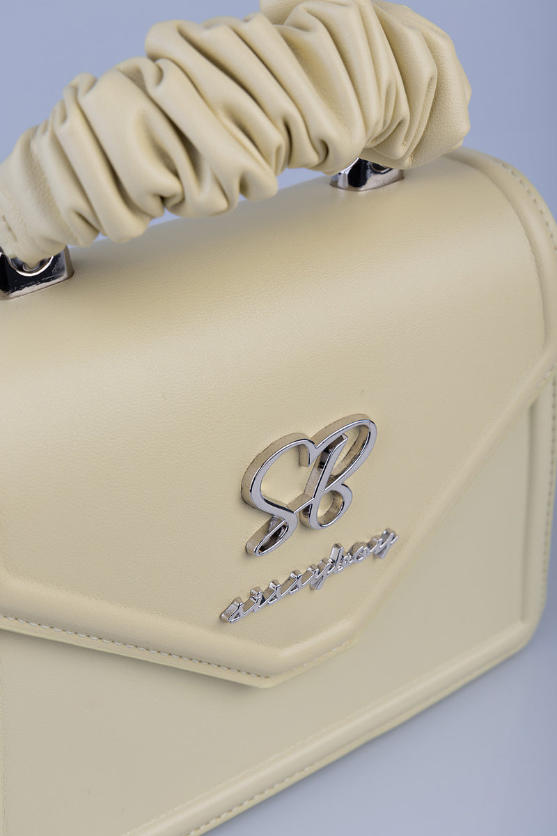 Primrose Mini Bag With Pompom Strap - Butter Yellow