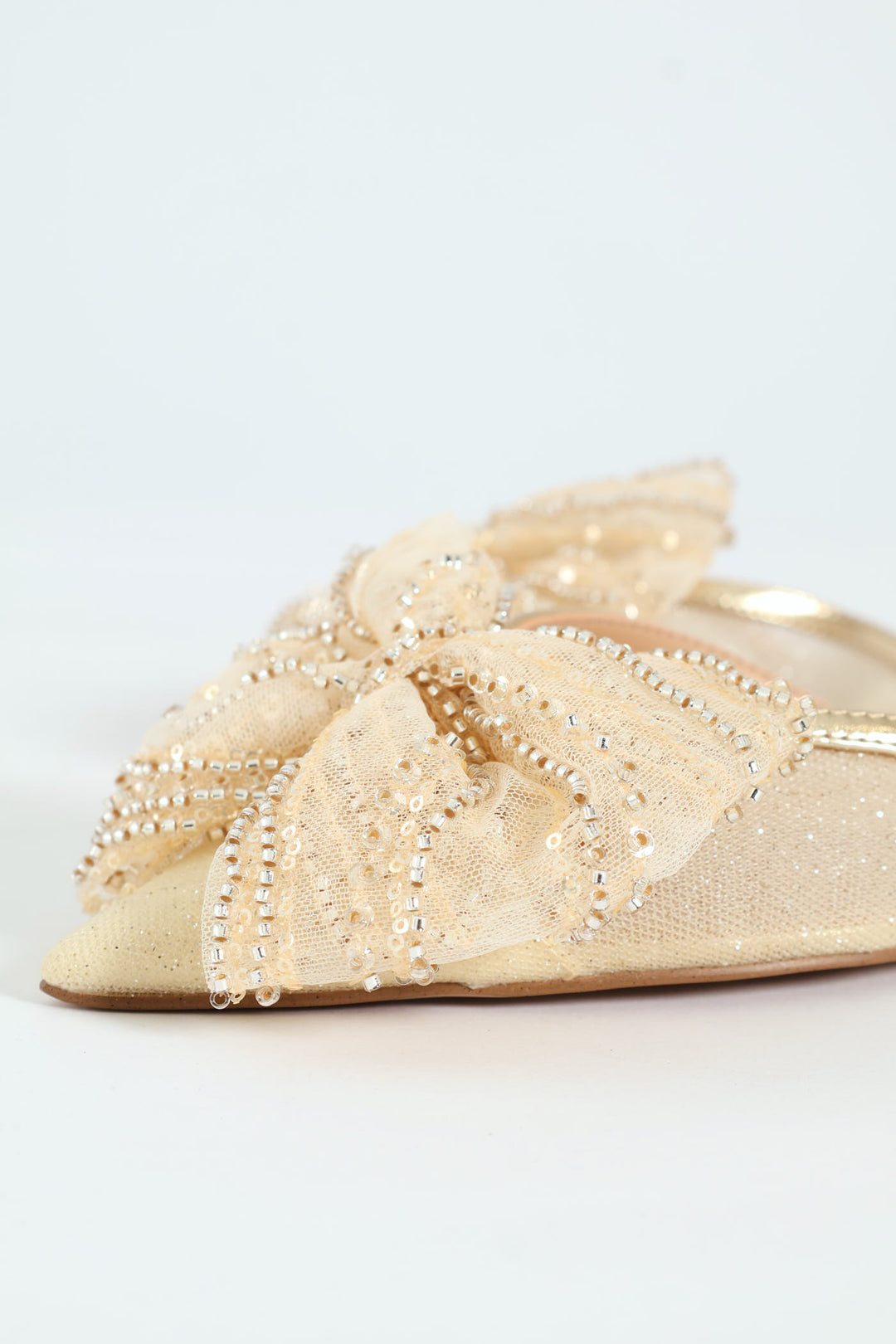 Calibria Pointed Toe Bow Sling Back - Gold