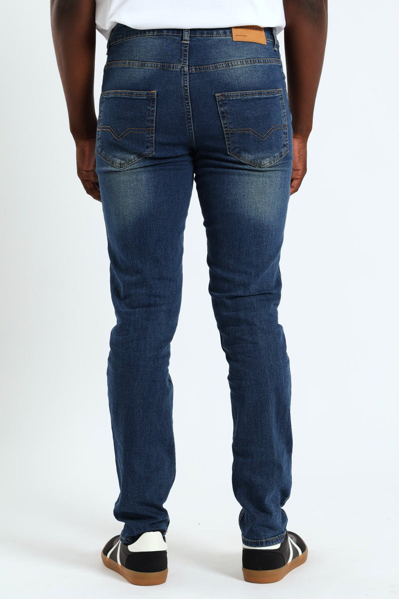 Mid Tint Creased Skinny Jean - Denim