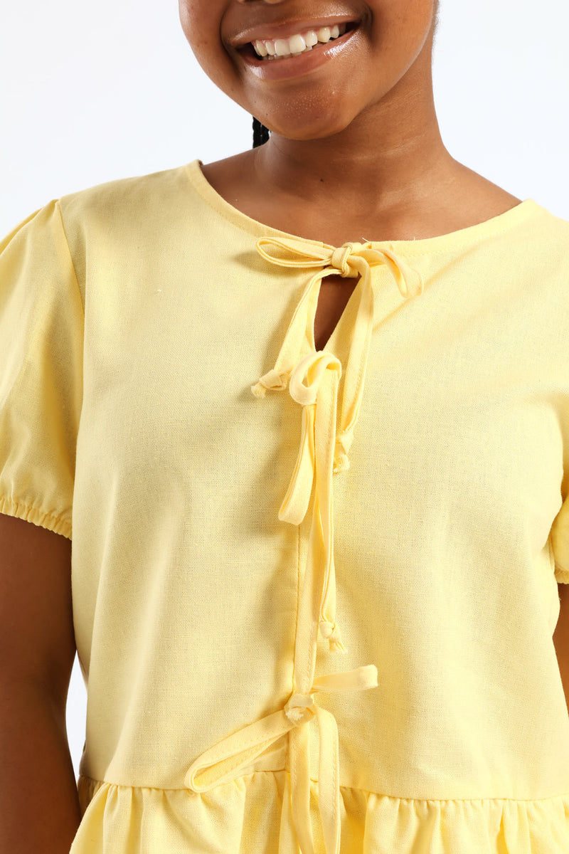 Girls Puff Sleeve Front Bow Detail Peplum Top - Pastel Yellow