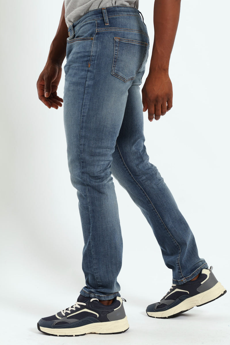 Mid Tint Blasted & Creased Slim Denim - Mid Blue