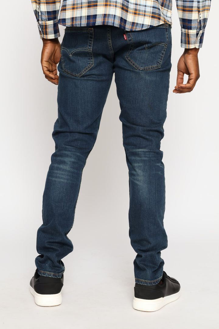 512 Canyon Dark Za Slim Taper Jean - Mid Wash
