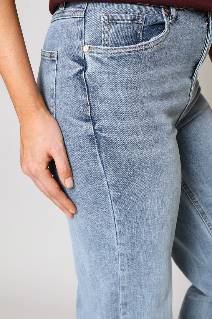 Hi-Rise Distressed Hem Straight Leg Denim - Light Wash