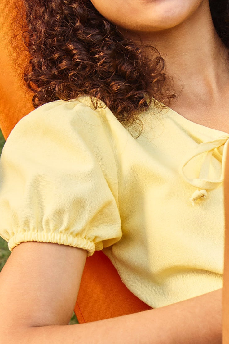 Girls Puff Sleeve Front Bow Detail Peplum Top - Pastel Yellow