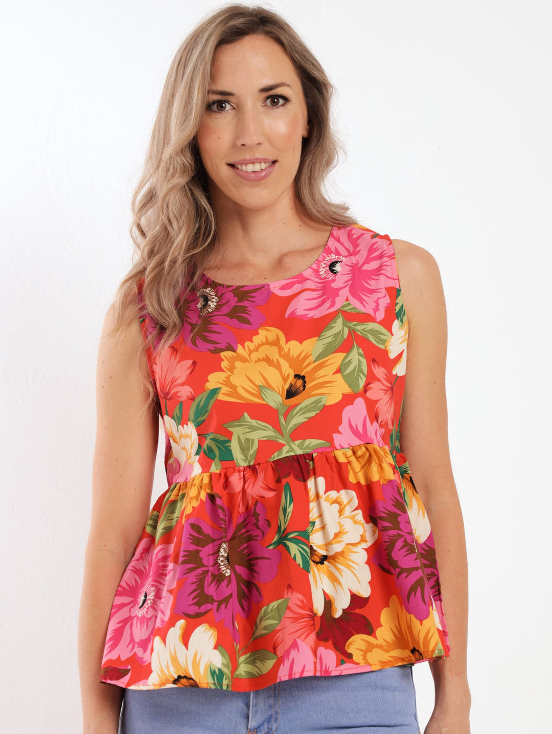 Ladies Sleeveless Peplum Blouse - Orange