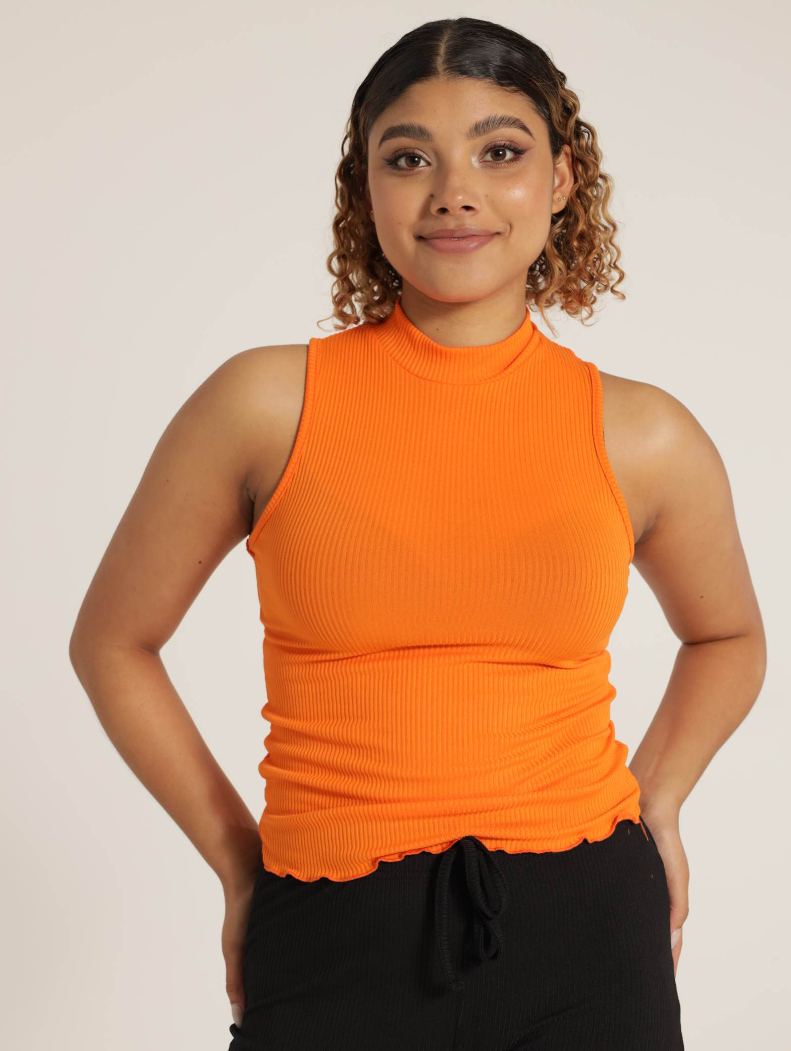 orange mock neck top