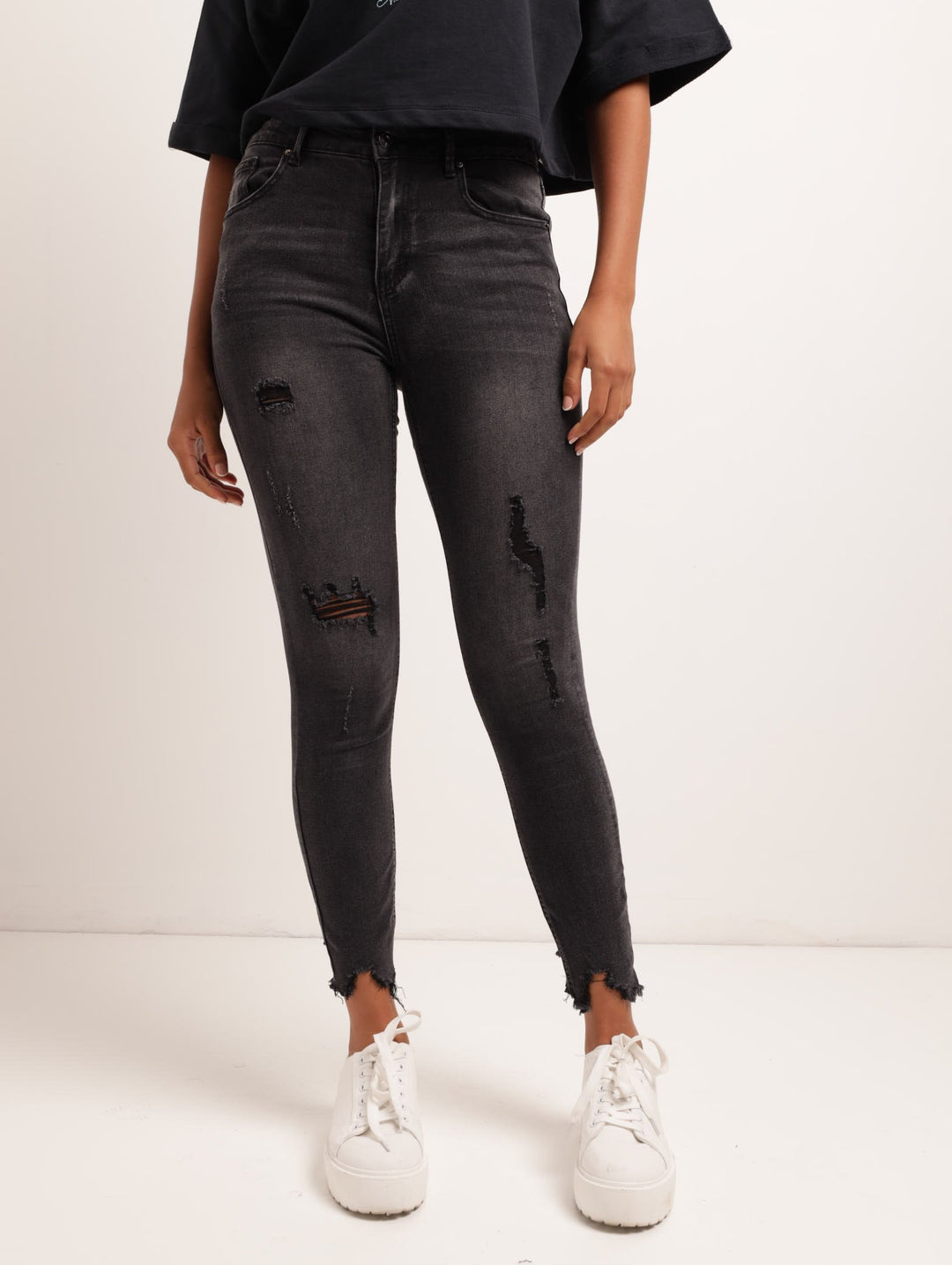 Ladies Black Ripped Sharkbite Skinny Denim Jean