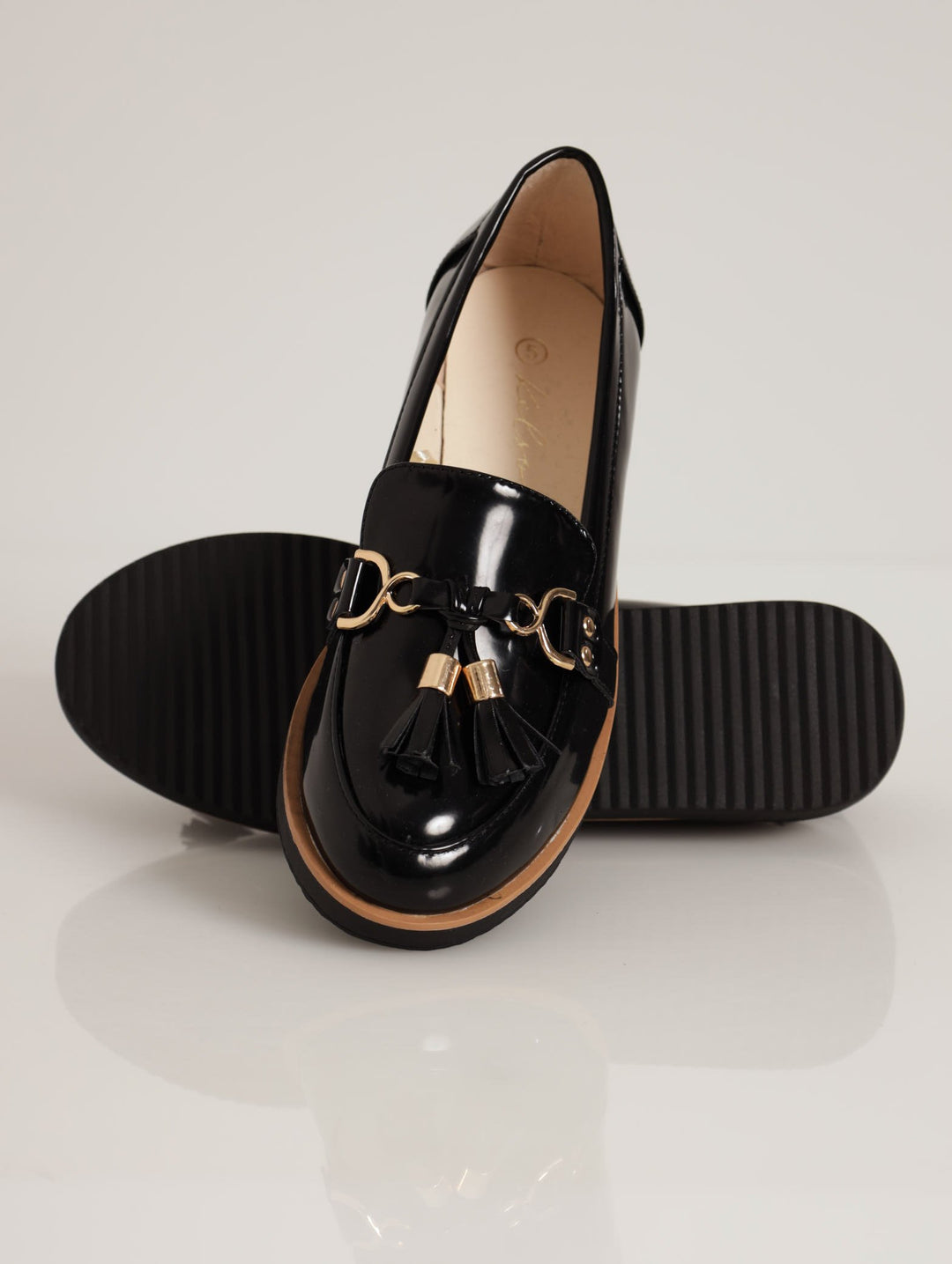 Ladies Metal Trim Loafer With Tassle Detail - Black